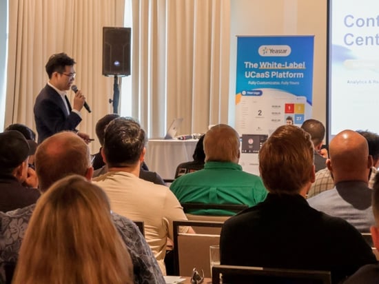 Photo of a speaker at Yeastar USA Partner Event 2025. Source: Yeastar