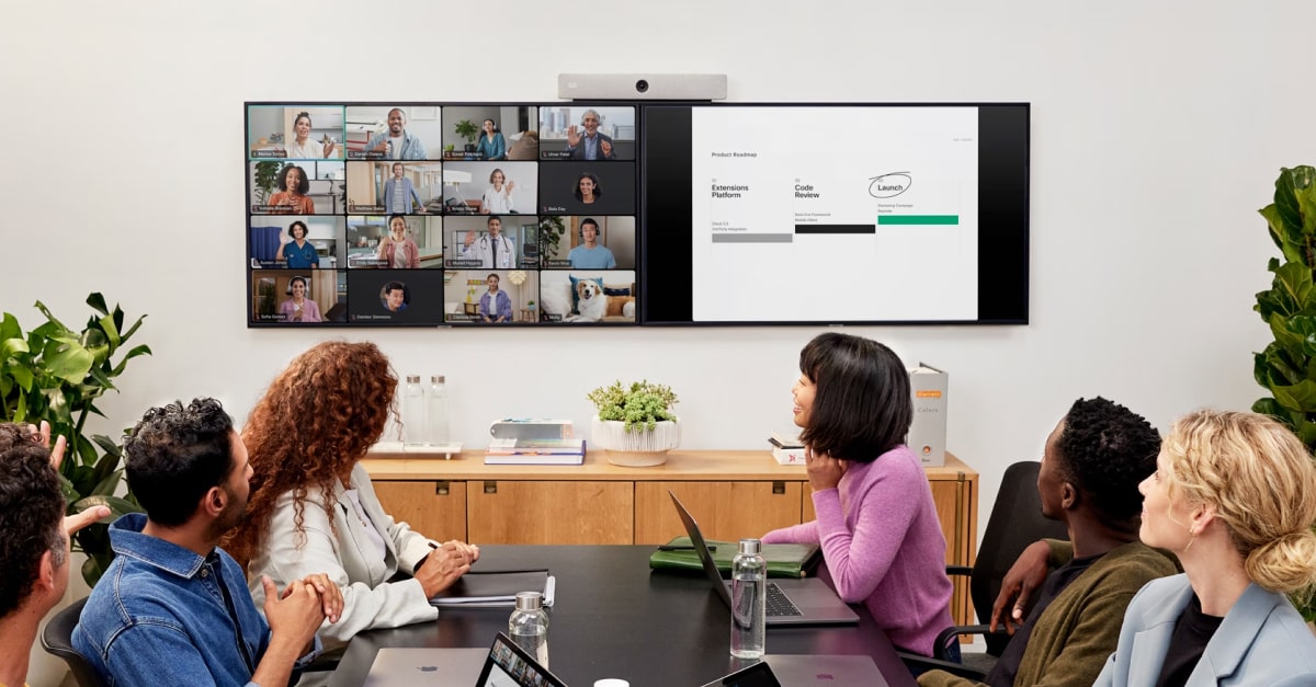 office workers participating in a videoconference - TeleDynamics blog