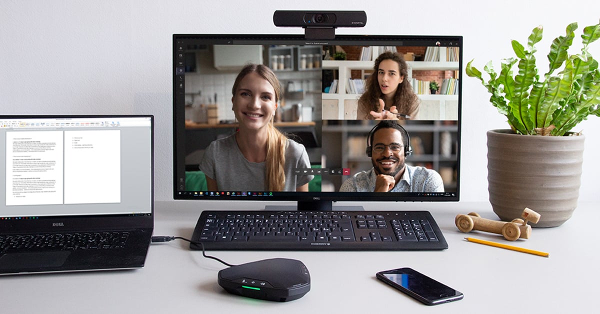 work-from-home setup with a Konftel Ego speakerphone and CAM 20 conference camera