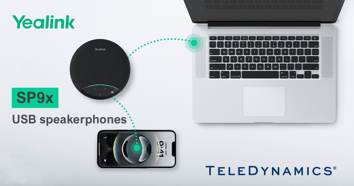 Yealink SP92 speakerphone next to a laptop and a smartphone - distributed by TeleDynamics
